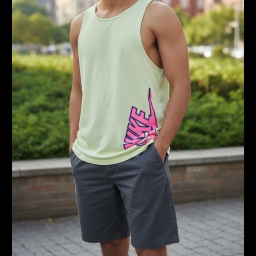 Nike Men’s revolution festival Tank Top with Pink Logo Accent